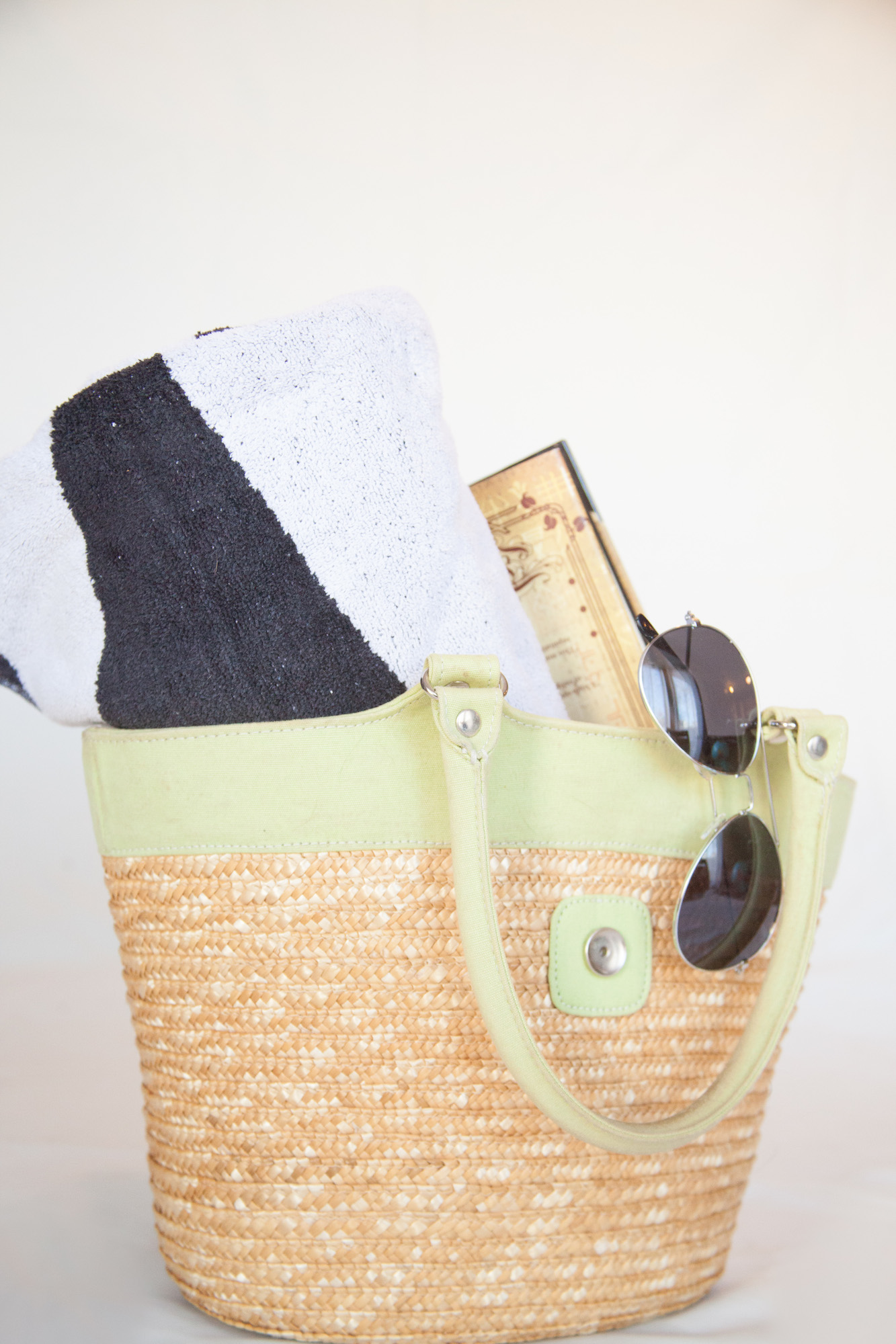 Bag with towel and sunglasses
